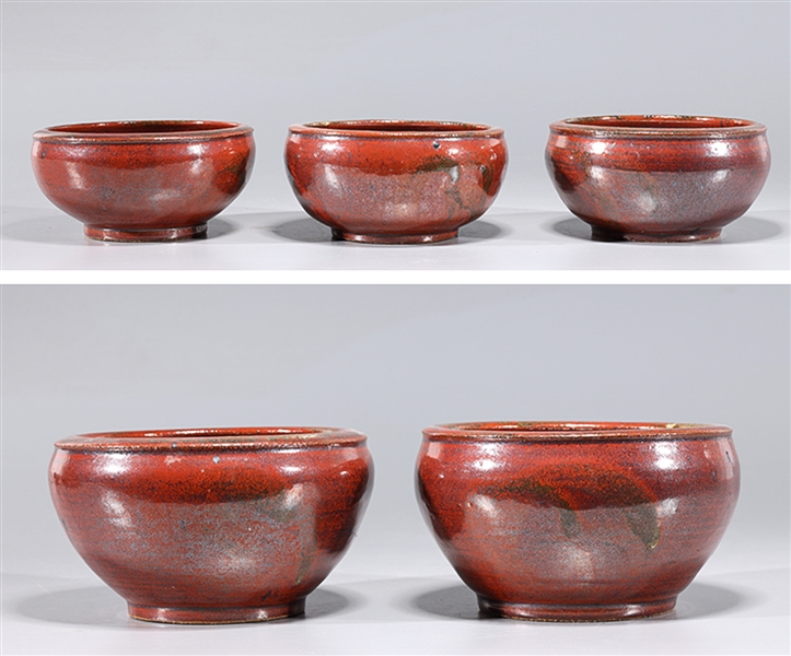 Five Chinese Sang de Boeuf Glazed Ceramic Bowls