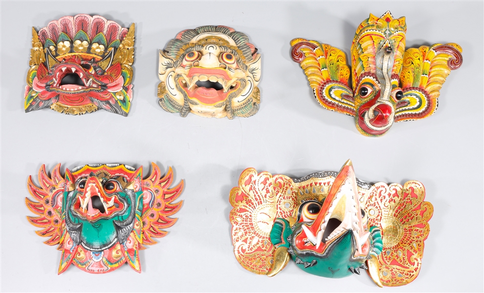 Group of Five Carved Indonesian Masks