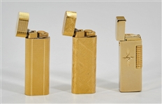 Group of Three Vintage Cartier and Penguin Lighters