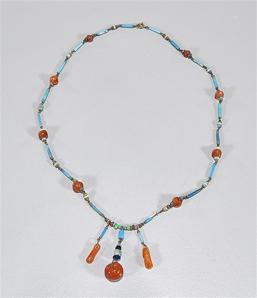 Necklace of Egyptian Late Period Faience and Carnelian Beads
