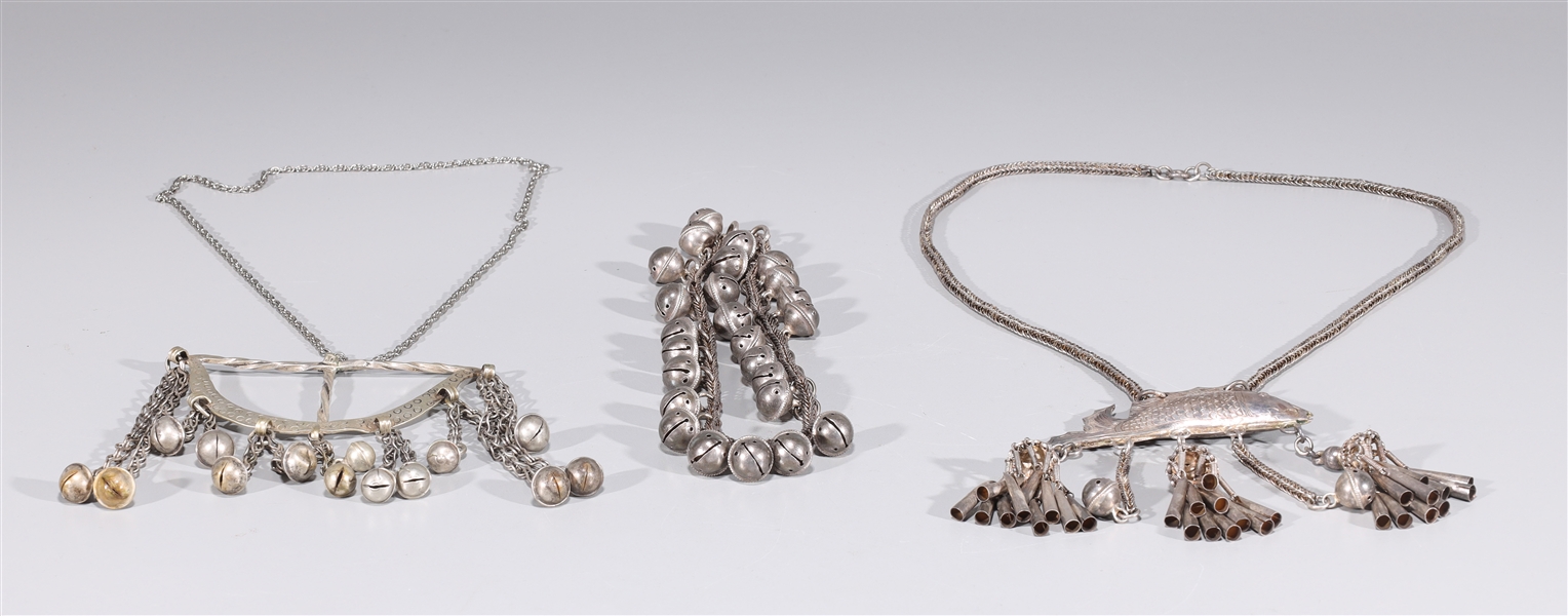 Three Sino-Tibetan White Metal Necklaces and Earrings