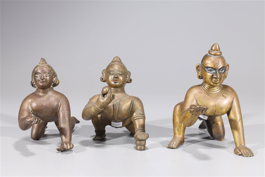 Group of Three Antique Indian Crawling Bala Krishna Statues