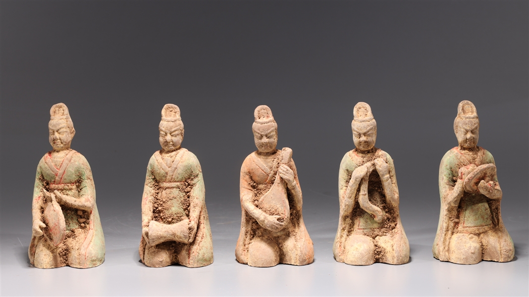 Group of Four Early Style Ceramic Musicians