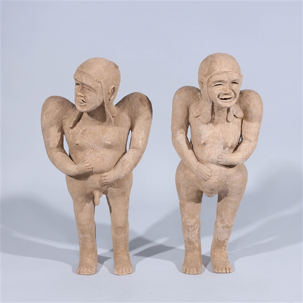 Pair of Chinese Early Style Pottery Figures