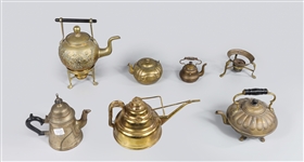 Group of Eight Brass and Silver Plate Teapots and Kettles
